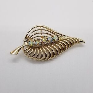 gold tone leaf brooch with AB rhinestones